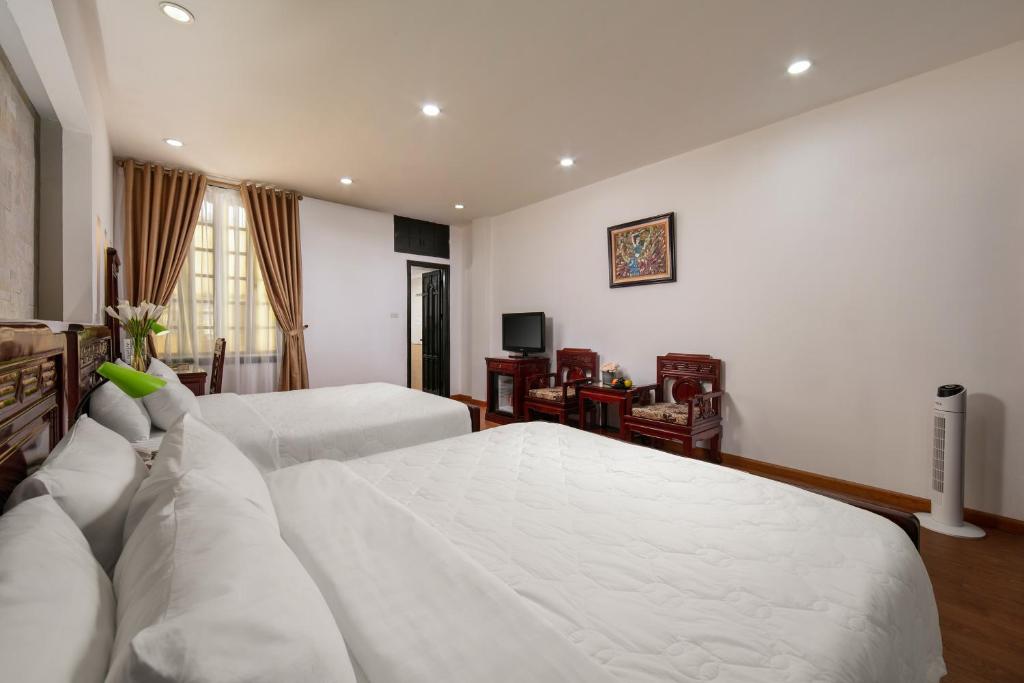 TV a/nebo společenská místnost v ubytování Little Diamond Hotel
