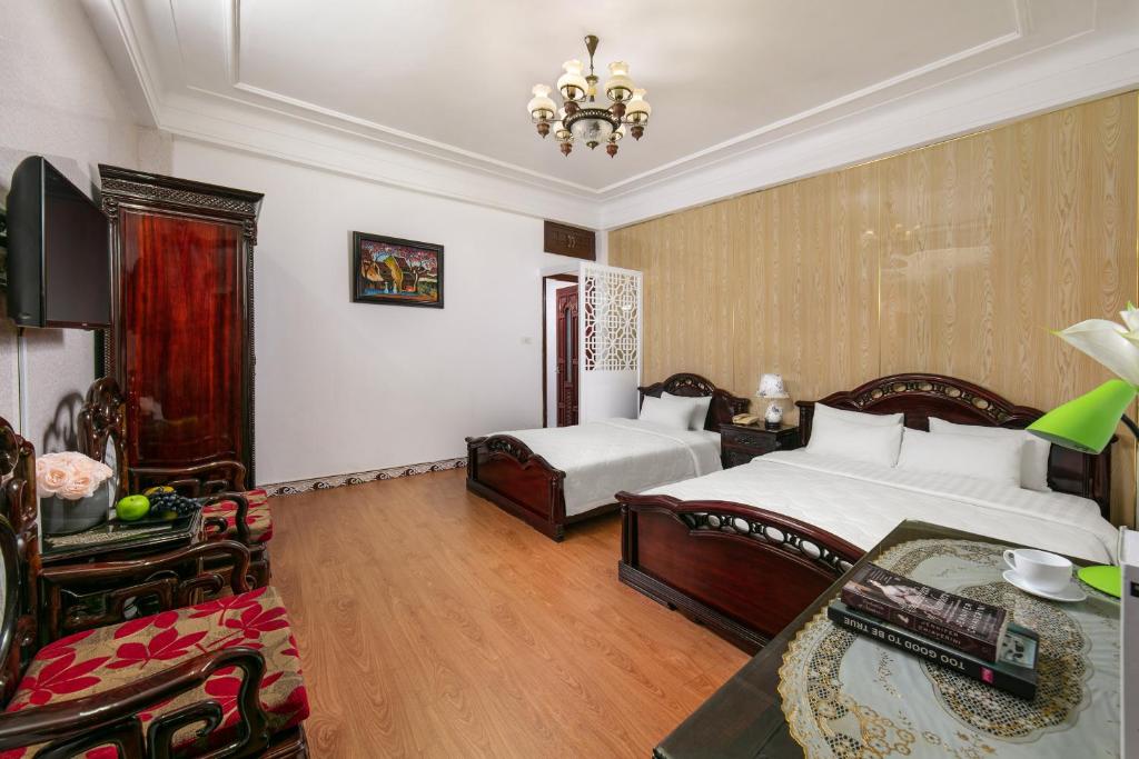 Postel nebo postele na pokoji v ubytování Little Diamond Hotel