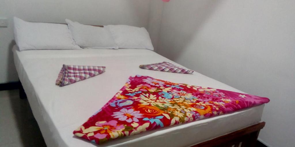 Postel nebo postele na pokoji v ubytování Lavendra Guset House