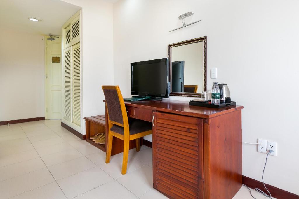 TV a/nebo společenská místnost v ubytování The Coast Hotel Vung Tau