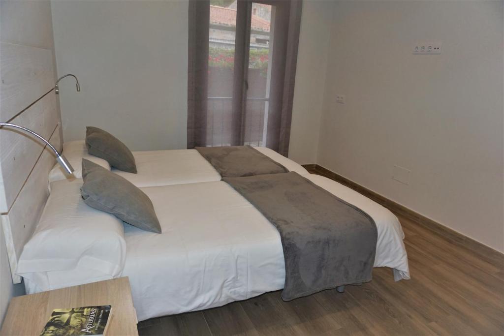 Postel nebo postele na pokoji v ubytování Apartamentos La Playina