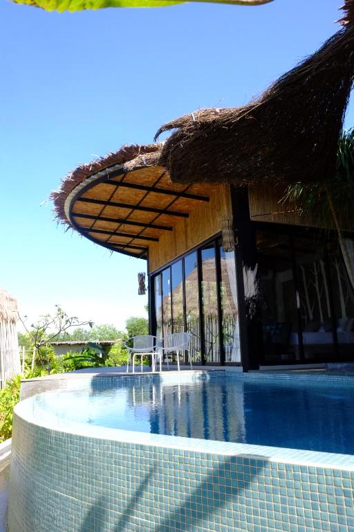Bazén v ubytování Awana Villa Resort Yaonoi - SHA Extra Plus nebo v jeho okolí