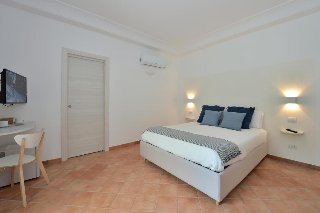 Posteľ alebo postele v izbe v ubytovaní Casa Amorino