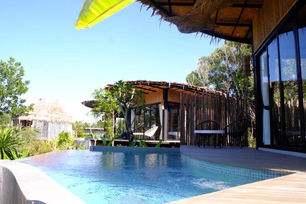 Bazén v ubytování Awana Villa Resort Yaonoi - SHA Extra Plus nebo v jeho okolí