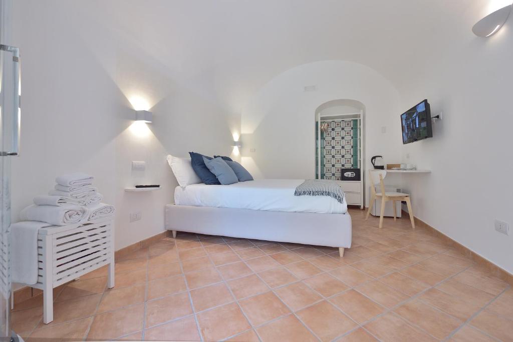 Posteľ alebo postele v izbe v ubytovaní Casa Amorino