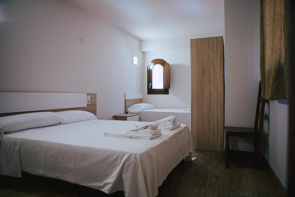 Cama o camas de una habitación en Apartamentos Ducay