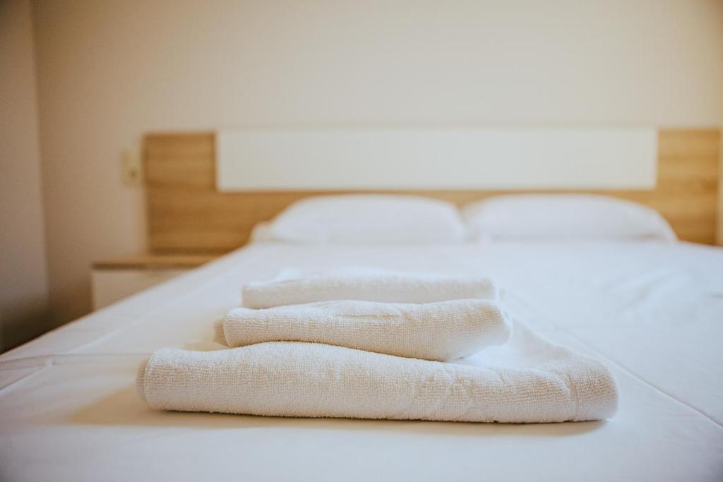 Cama o camas de una habitación en Apartamentos Ducay