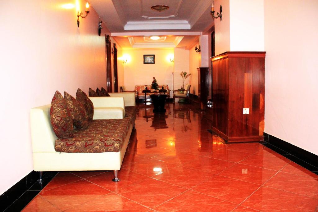 Posezení v ubytování Nawin Palace Guesthouse