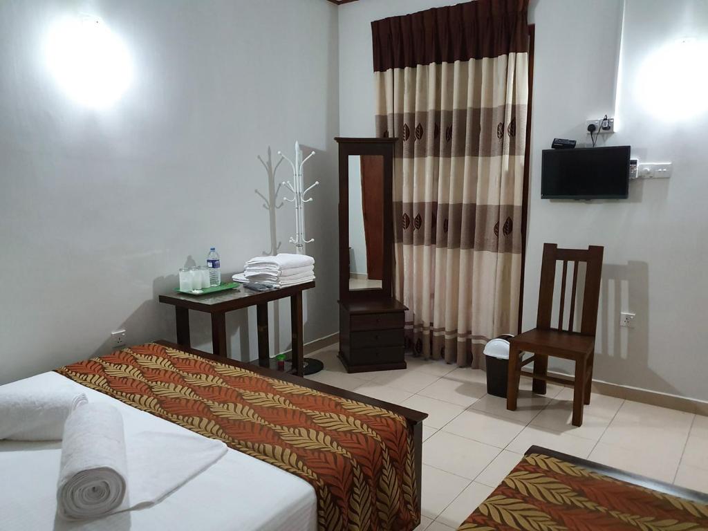 Postel nebo postele na pokoji v ubytování A and D Holiday Inn