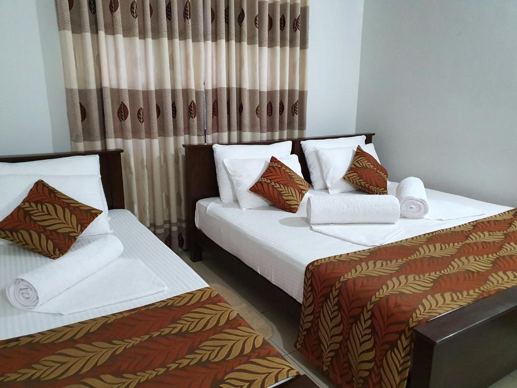 Postel nebo postele na pokoji v ubytování A and D Holiday Inn