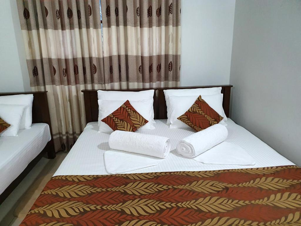 Postel nebo postele na pokoji v ubytování A and D Holiday Inn