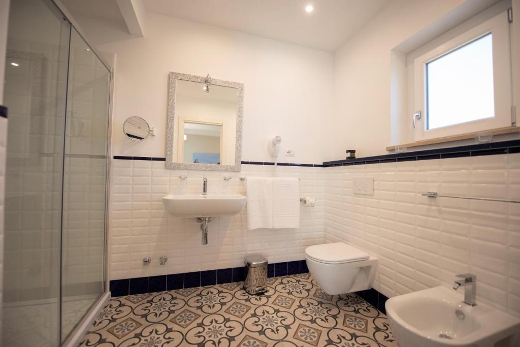 Koupelna v ubytování Sui Generis Tropea Luxury Rooms