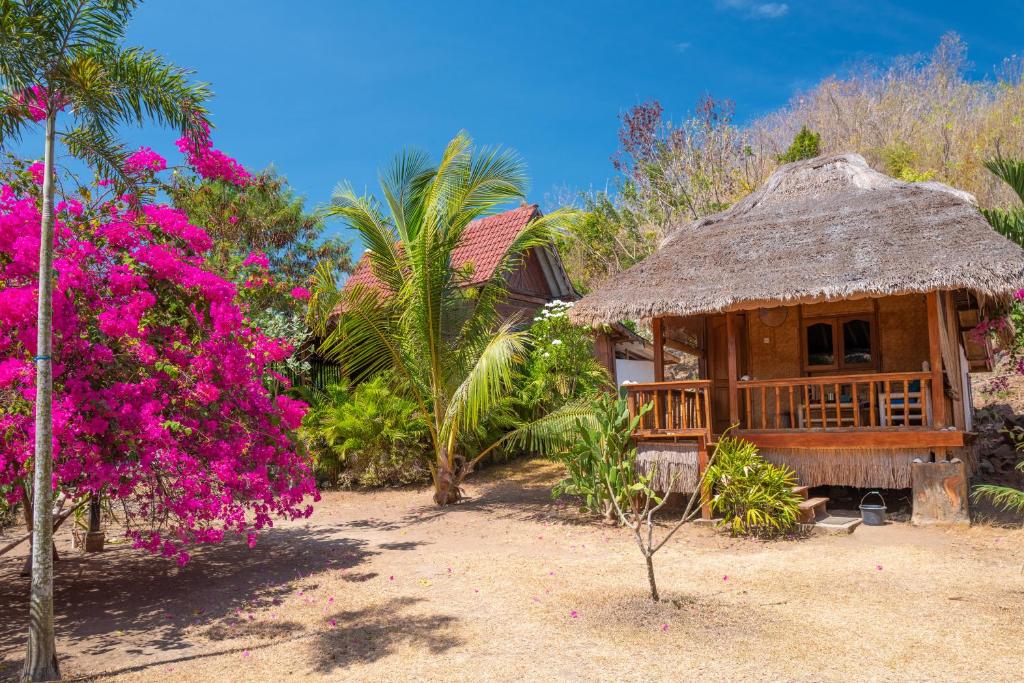 Zahrada ubytování Palmyra Indah Bungalows