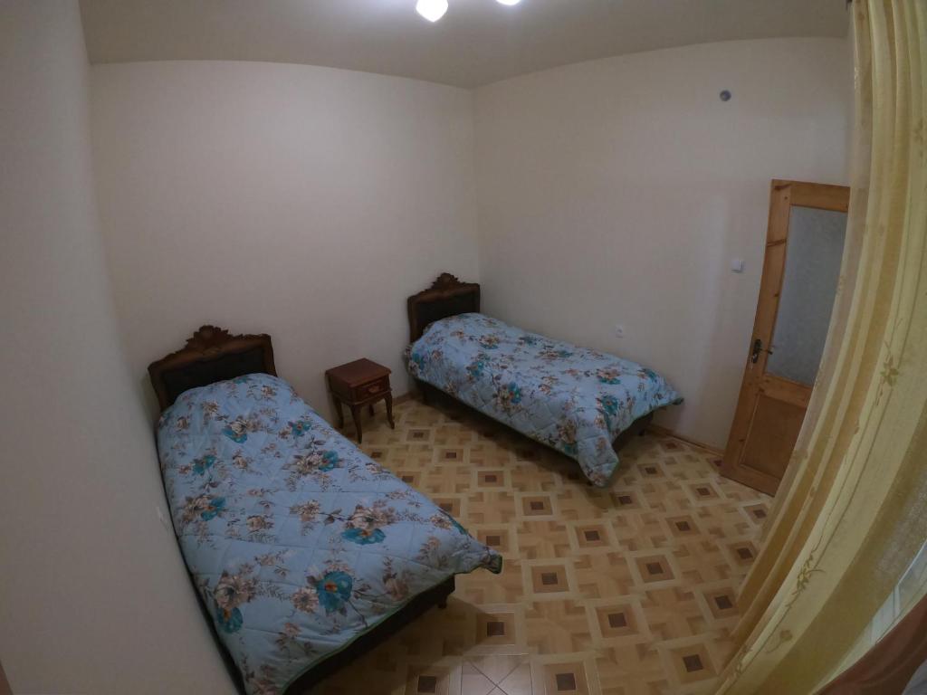 Postel nebo postele na pokoji v ubytování NNN Guest House