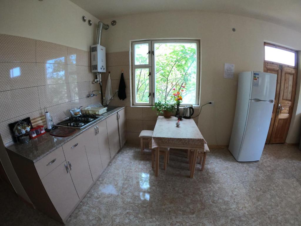 Kuchyň nebo kuchyňský kout v ubytování NNN Guest House