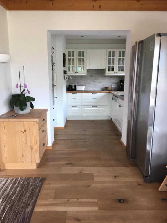 Kuchyň nebo kuchyňský kout v ubytování Apartment Hahnenkammblick
