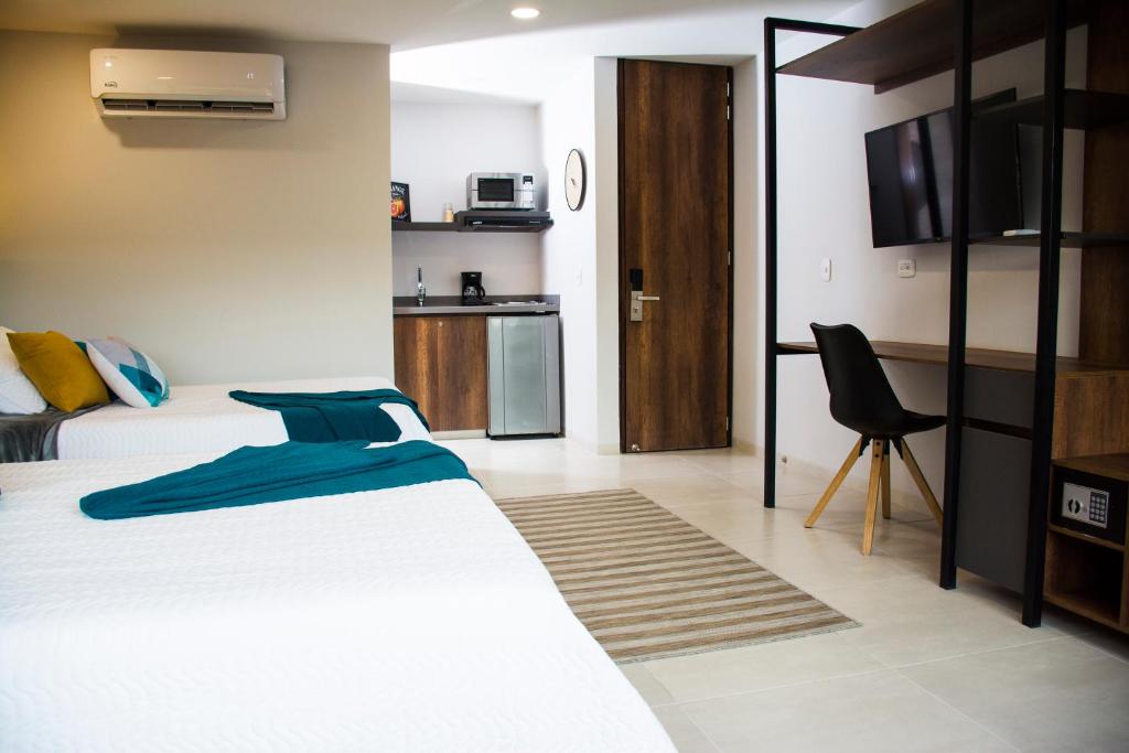 Kuchyň nebo kuchyňský kout v ubytování Kapital Suites