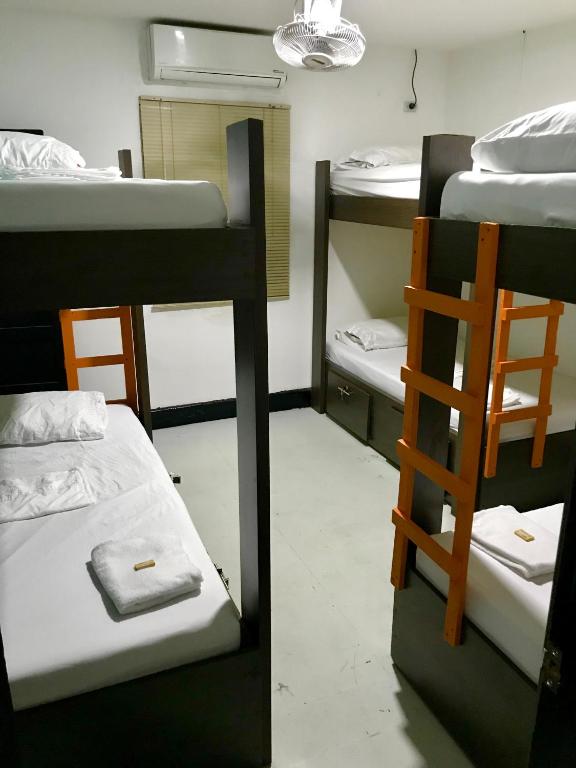 Postel nebo postele na pokoji v ubytování La Quinta Bacana