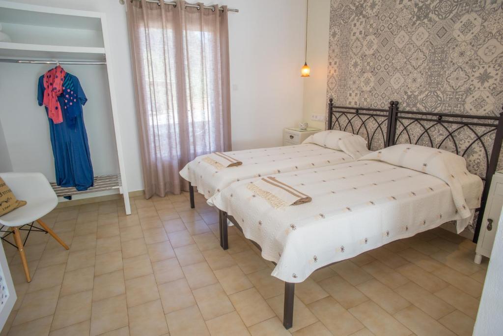 Postel nebo postele na pokoji v ubytování Cyclades Studios