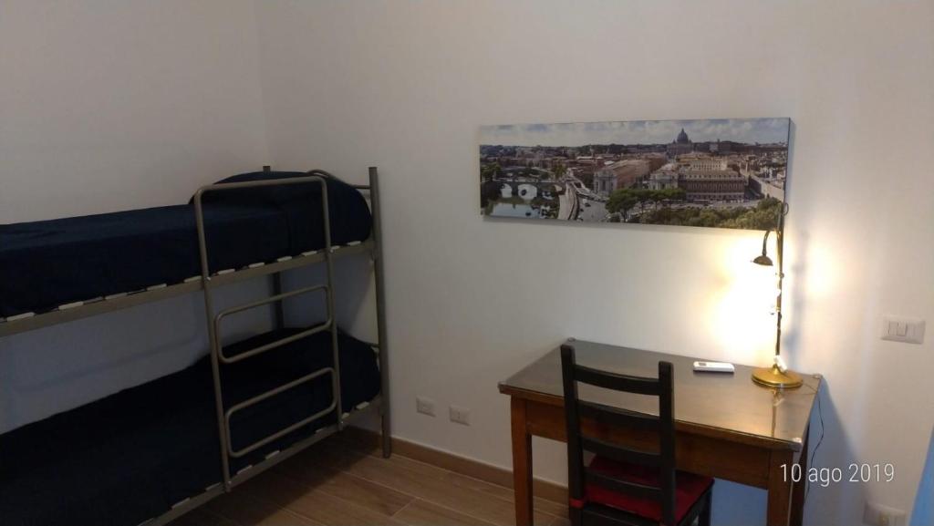 Łóżko lub łóżka w pokoju w obiekcie Casa di Rosita