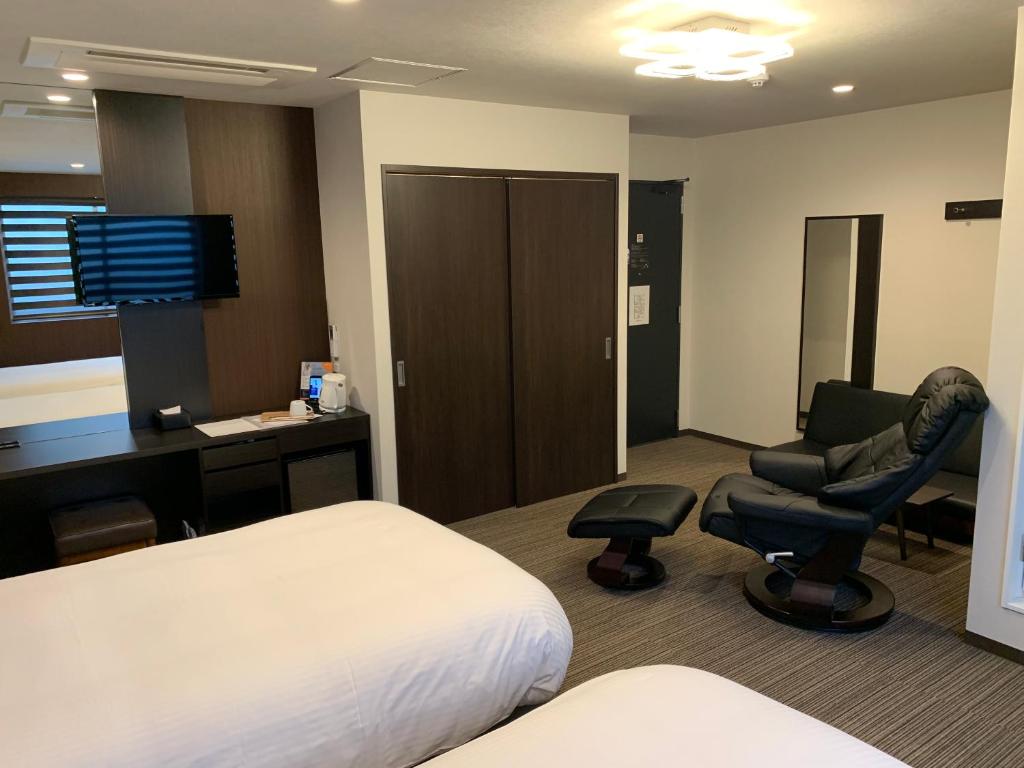 TV a/nebo společenská místnost v ubytování Hotel Kojan