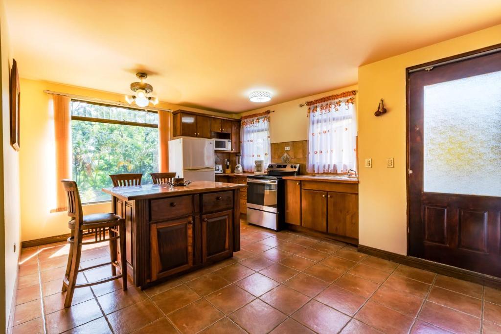 Kuchyň nebo kuchyňský kout v ubytování La Terraza Guest House B&B