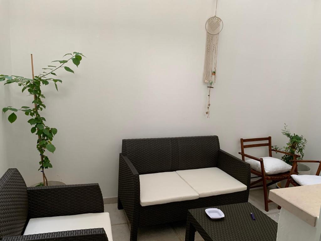 Posezení v ubytování Les 3 Chambres