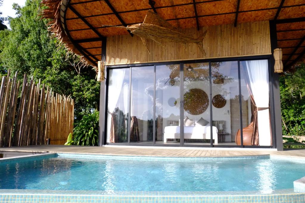 Bazén v ubytování Awana Villa Resort Yaonoi - SHA Extra Plus nebo v jeho okolí