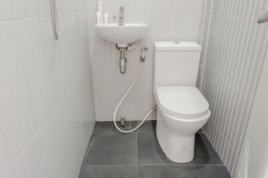 Koupelna v ubytování Super OYO Capital O 1176 J3 Residence Syariah