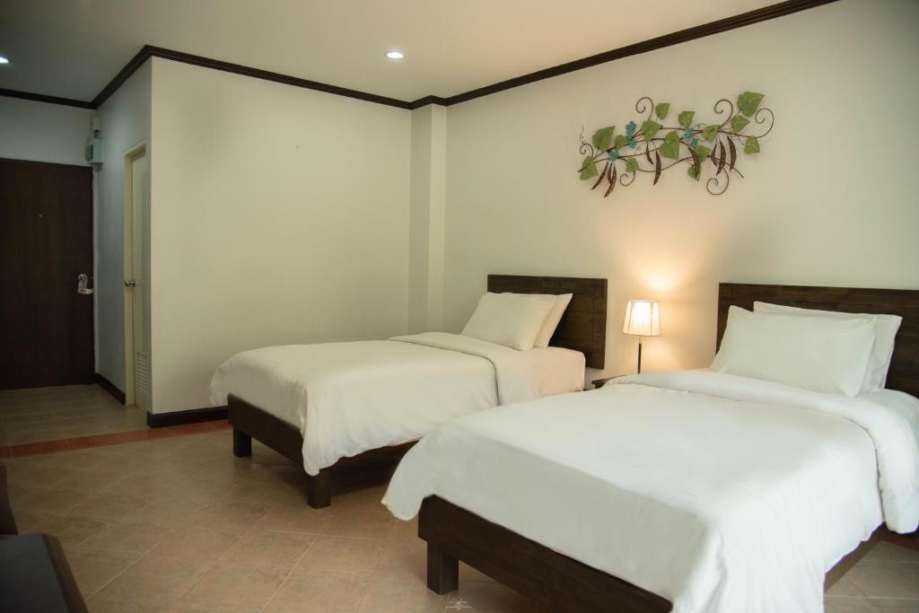 Postel nebo postele na pokoji v ubytování Park 38 Hotel - SHA Plus