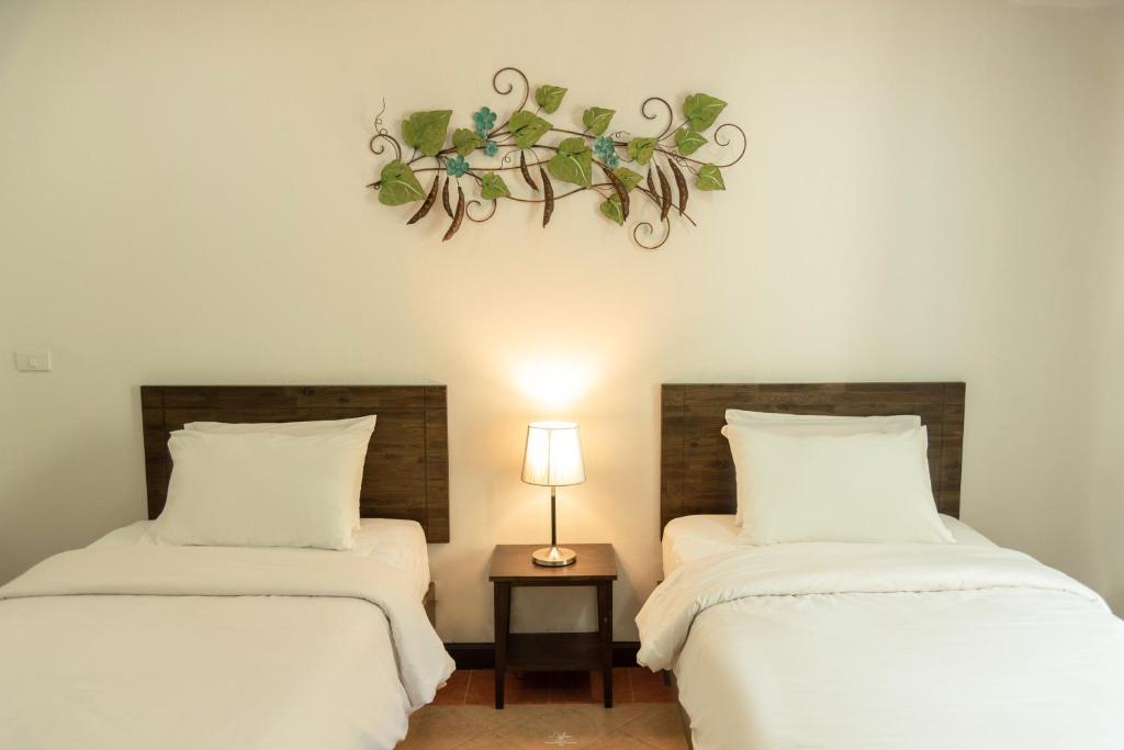 Postel nebo postele na pokoji v ubytování Park 38 Hotel - SHA Plus