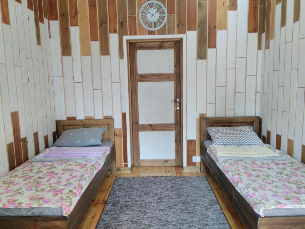 Postel nebo postele na pokoji v ubytování Отель "Swallow House"