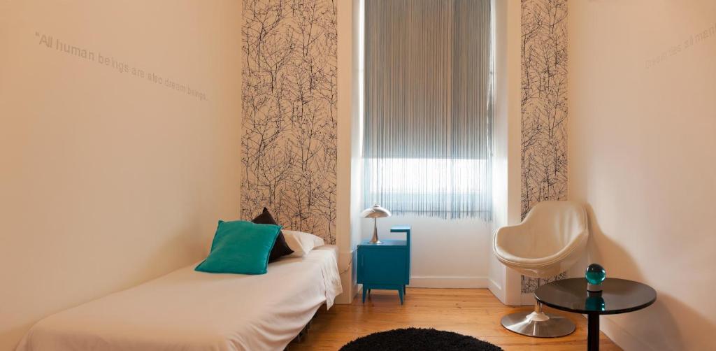 Postel nebo postele na pokoji v ubytování Living Lounge Hostel