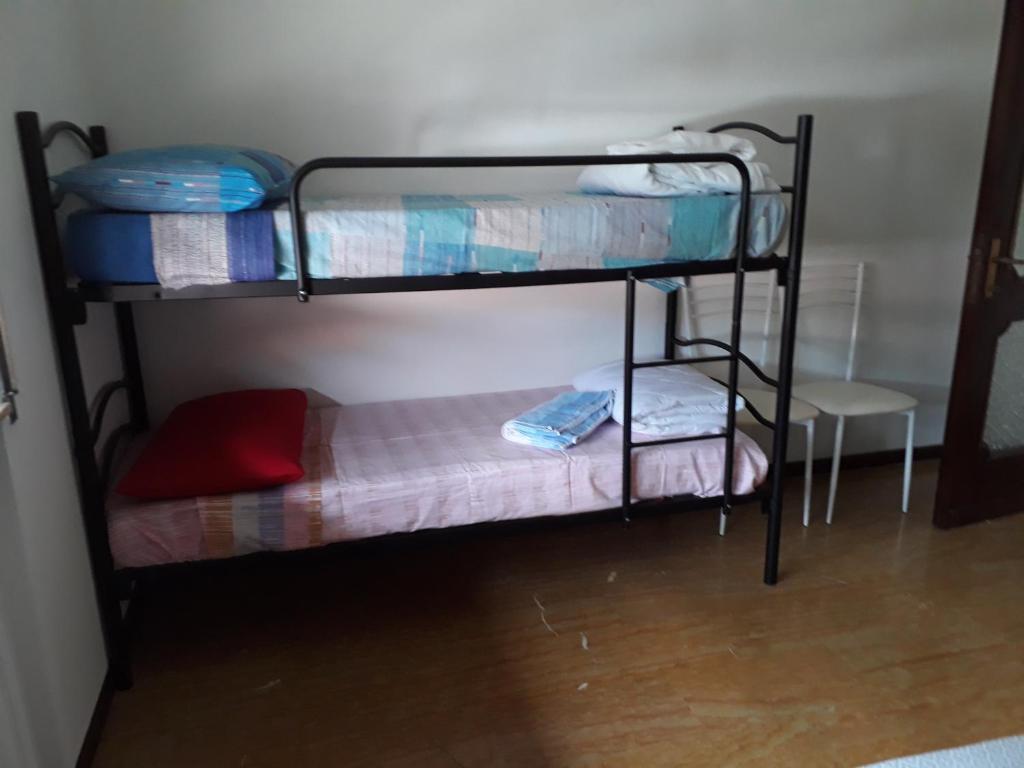 Postel nebo postele na pokoji v ubytování Casa di Ica