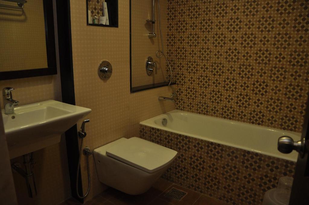 Koupelna v ubytování Lakshmi Hotel