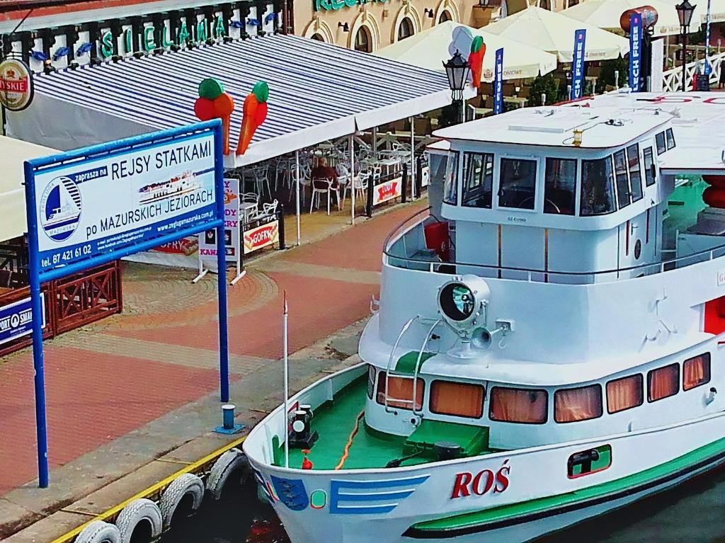 Fotografia z galérie ubytovania Mazurska Chata jezioro i aquapark 6 min, centrum i promenada 12 min v destinácii Mikołajki