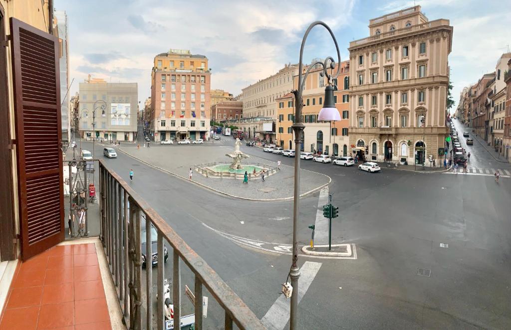 a view of a city street from a balcony at Luxury barberini boutique Apartment in Rome