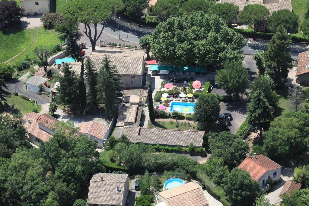 an aerial view of a house with a yard at HOTEL GALIMAR in Lamalou-les-Bains