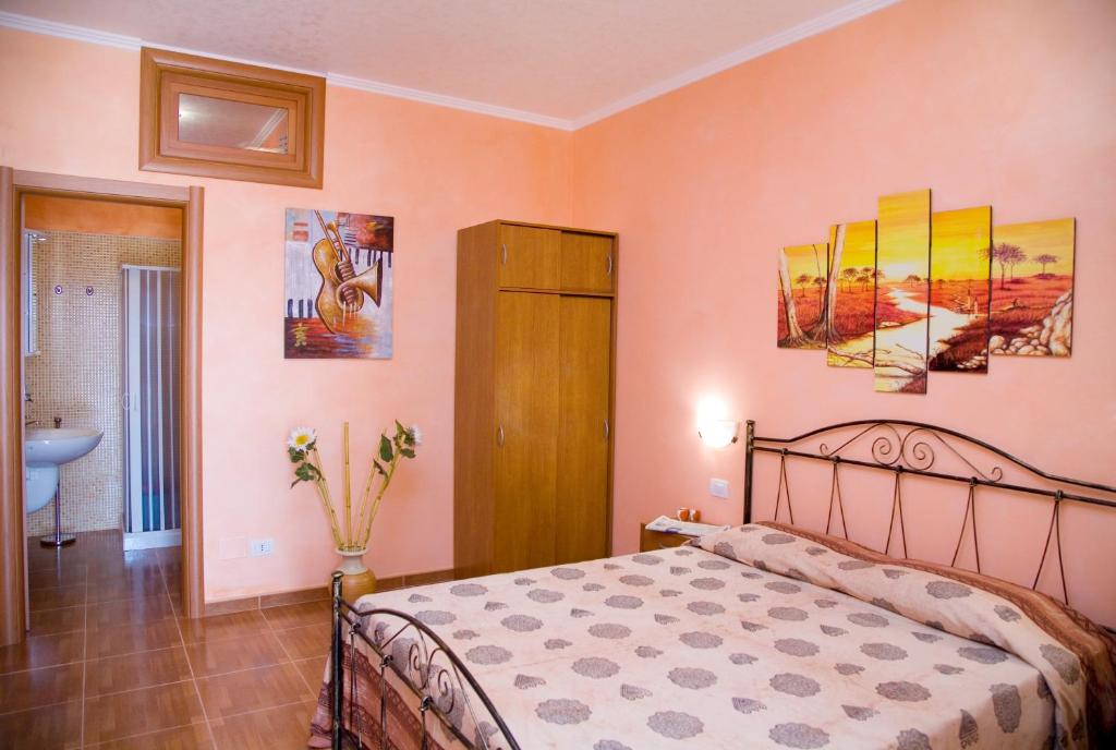 Postel nebo postele na pokoji v ubytování Villa Terra Nostra