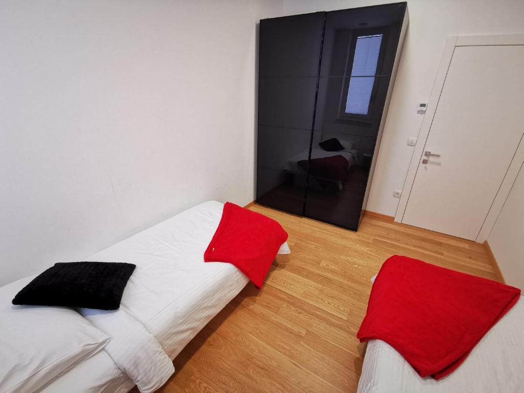 Postel nebo postele na pokoji v ubytování Argo Apartments