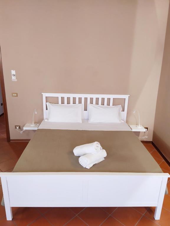 Postel nebo postele na pokoji v ubytování Carducci 49