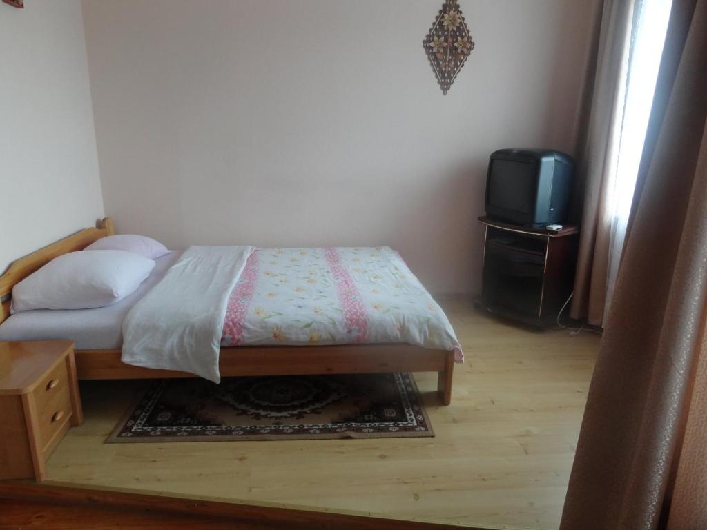 Postel nebo postele na pokoji v ubytování Hotel Rebir