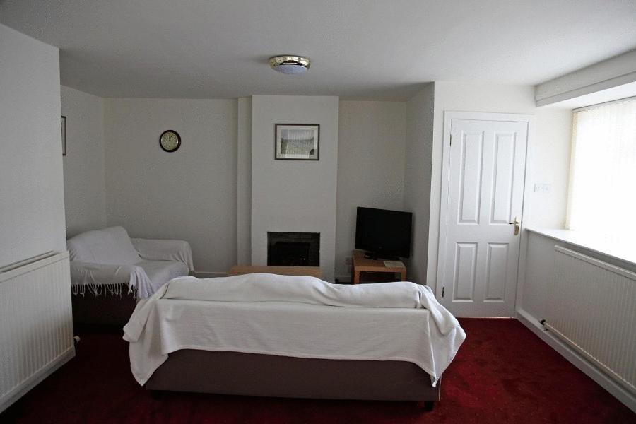 Postel nebo postele na pokoji v ubytování Balmoral Hotel