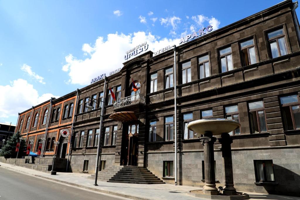 a large building on the side of a street at Araks Hotel Complex in Gyumri