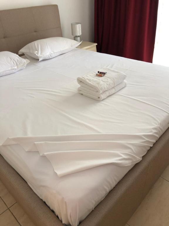 Postel nebo postele na pokoji v ubytování Academy Hotel
