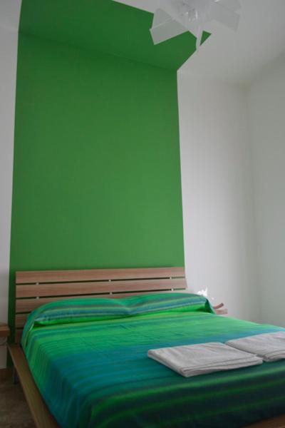 A bed or beds in a room at Porta Nuova