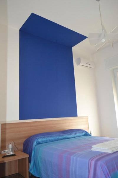 A bed or beds in a room at Porta Nuova