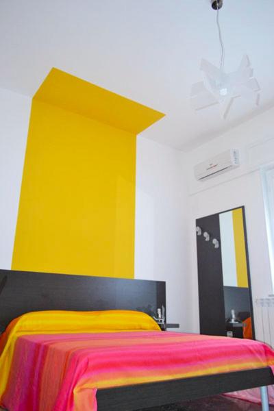 A bed or beds in a room at Porta Nuova