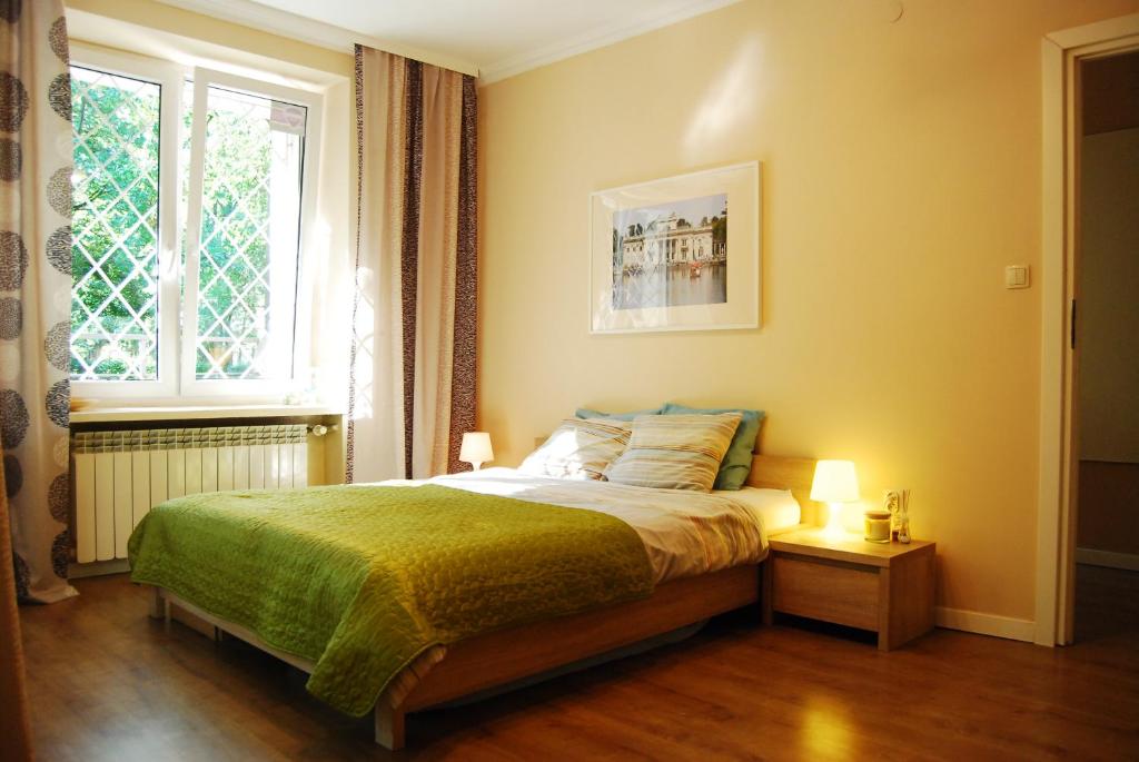 Postel nebo postele na pokoji v ubytování Bed & Breakfast Sielce Warszawa