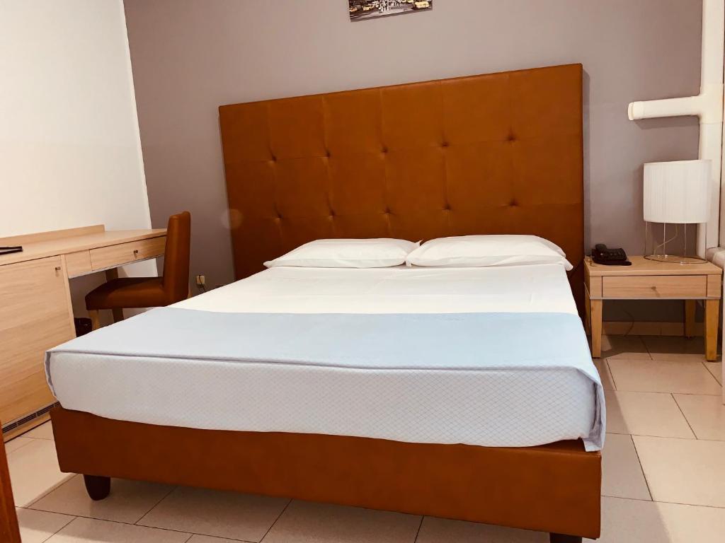 Postel nebo postele na pokoji v ubytování Flying Hotel